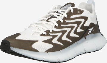 Baskets basses 'Zig Kinetica 21' Reebok en marron : devant