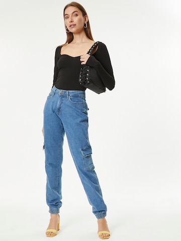 Effilé Jeans cargo Urban Classics en bleu