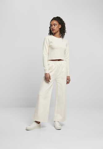 Wide leg Pantaloni di Urban Classics in beige