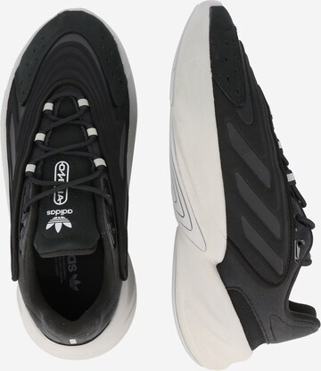 ADIDAS ORIGINALS Sneakers low 'Ozelia' i svart