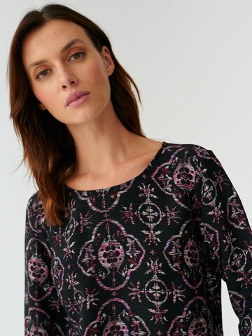 TATUUM - Blusa 'TRIKA' en negro