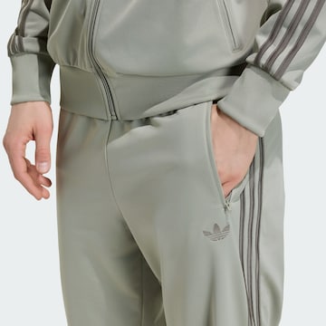 regular Pantaloni 'Firebird' di ADIDAS ORIGINALS in grigio