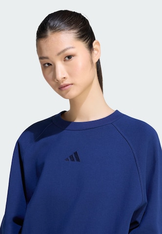 ADIDAS SPORTSWEAR - Camiseta deportiva en azul