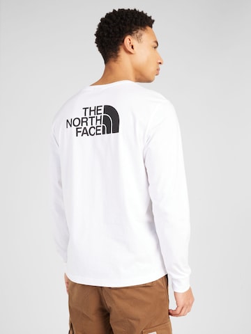 THE NORTH FACE Футболка в Белый