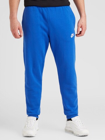 Nike Sportswear Tapered Trousers in Blue: front