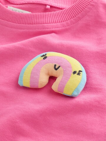 Set Next en rose