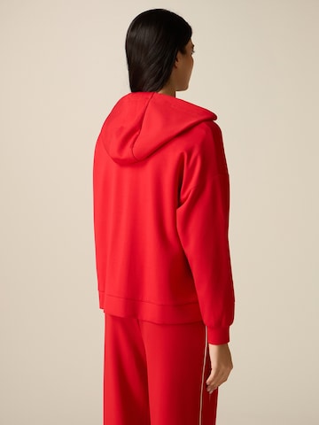 Pullover di oltre in rosso