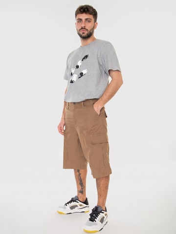 Carhartt WIP Luźne Spodnie 'Buffalo' w kolorze brązowy