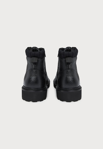 Boots stringati 'Julyo' di BOSS in nero