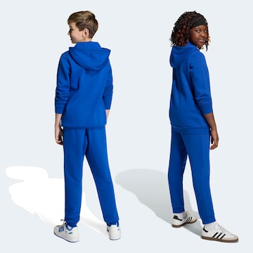 ADIDAS ORIGINALS Zúžený strih Nohavice 'Trefoil Essentials' - Modrá