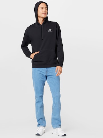 new balanceSweater majica 'Essentials' - crna boja