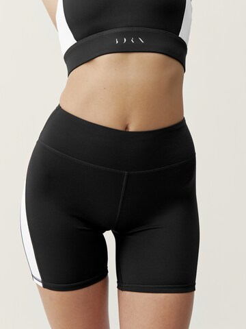 Born Living Yoga Skinny Workout Pants 'Latika' in Black: front