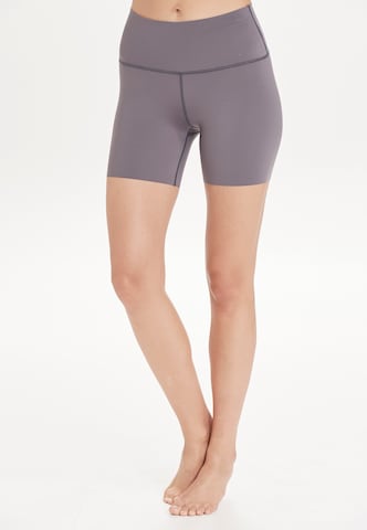 Athlecia Skinny Workout Pants 'Almy' in Grey: front