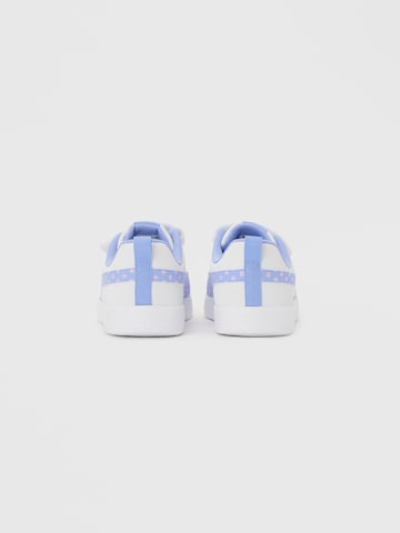 PUMA Tennarit 'Courtflex V3 Dotty V' värissä valkoinen