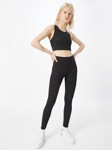 Skinny Pantaloni sportivi 'Studio Foundation' di PUMA in nero