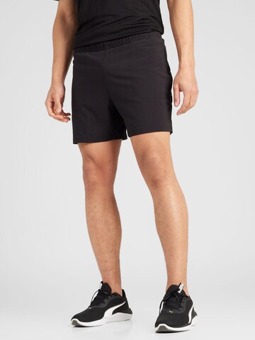 Regular Pantalon de sport 'Seasons' PUMA en noir : devant