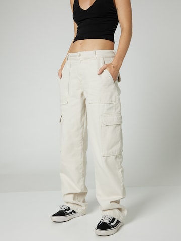 A LOT LESS Wide leg Trousers 'Frances' in Beige: front