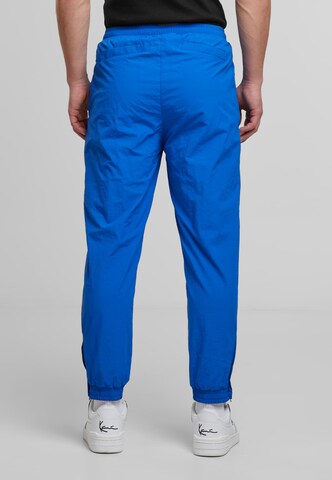 Loosefit Pantaloni sportivi di Karl Kani in blu