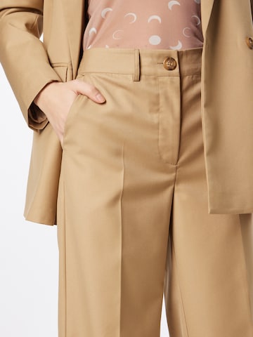 Wide leg Pantaloni con piega frontale di Sofie Schnoor in beige