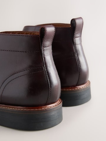 Next - Botas con cordones en marrón
