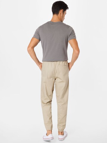 Effilé Pantalon 'Downtown' PUMA en beige