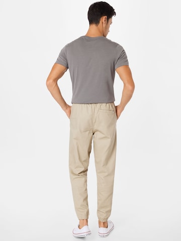 PUMA Tapered Pants 'Downtown' in Beige