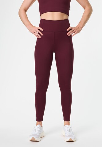 Skinny Pantalon de sport Girlfriend Collective en rouge : devant