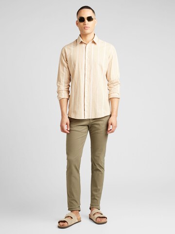 TOMMY HILFIGER Slim fit Chino Pants 'BLEECKER ESSENTIAL' in Green