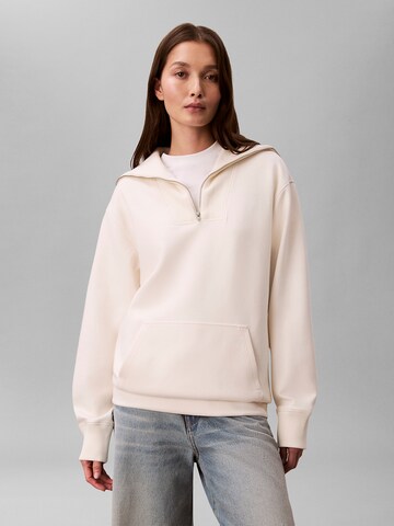 Sweat-shirt Calvin Klein en beige : devant