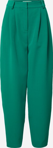 Guido Maria Kretschmer Women Trousers with creases 'Inka' in Green: front