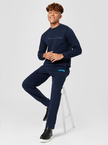 Champion Authentic Athletic Apparel Tapered Broek in Blauw