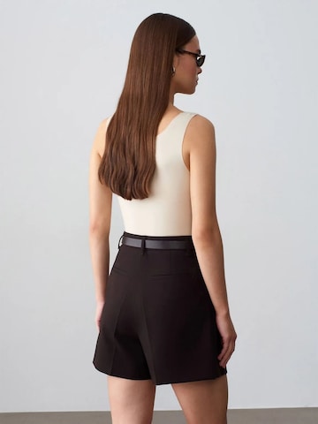 Top di Dilvin in beige