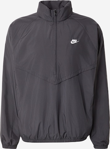 Nike Sportswear Átmeneti dzseki 'WR' - fekete: elől