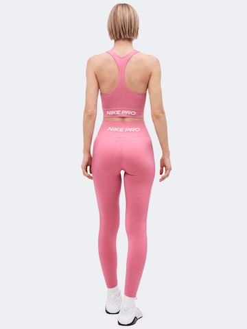 NIKE Skinny Παντελόνι φόρμας 'Nike Pro' σε ροζ