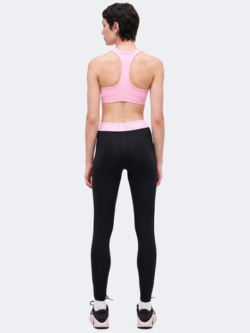 Skinny Pantaloni sportivi 'NP 365' di NIKE in nero