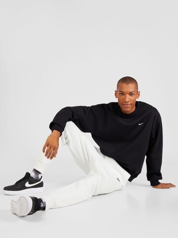 juoda Nike Sportswear Megztinis be užsegimo 'Swoosh'