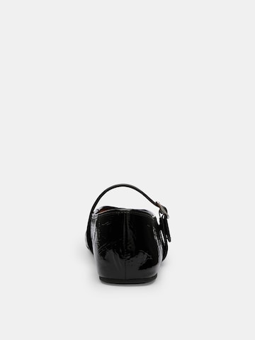 Ballerina con cinturino di COACH in nero