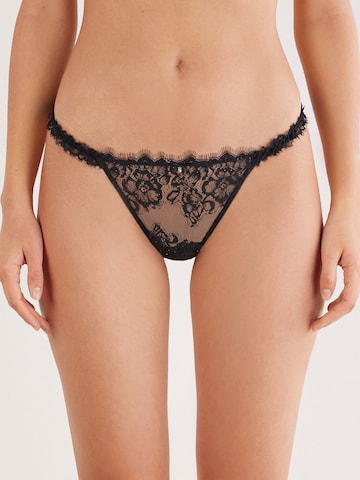 INTIMISSIMI String 'GLIMMER OF PLEASURE' in Schwarz: Vorderseite