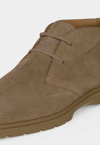 BOSS - Botines chukka 'Orlan' en beige: frente