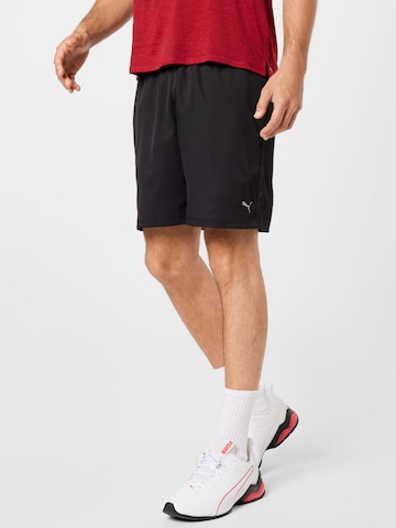 PUMA Regular Workout Pants in Black: front