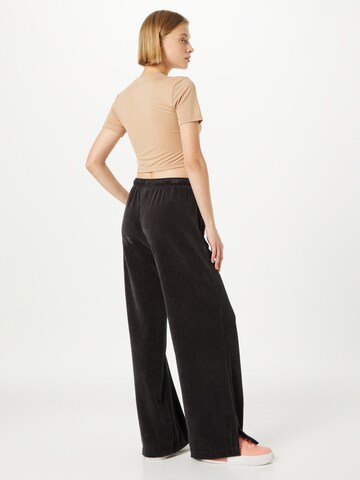 Nike Sportswear Wide leg Byxa i svart