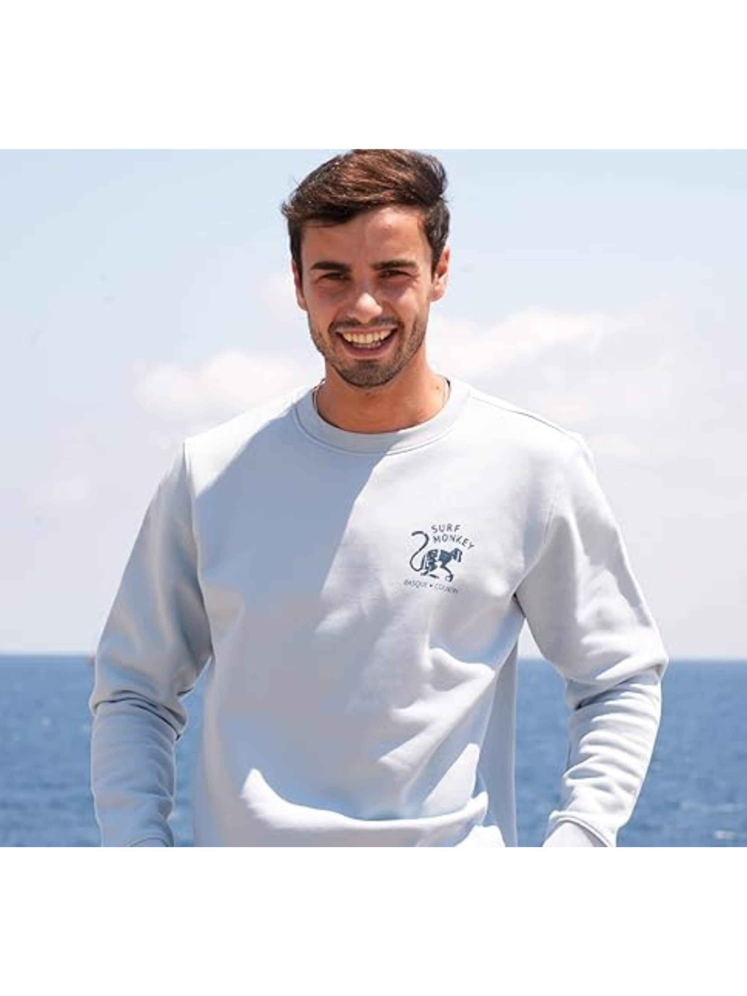 Surf Monkey - Sudadera 'Rette das Ozean' en azul