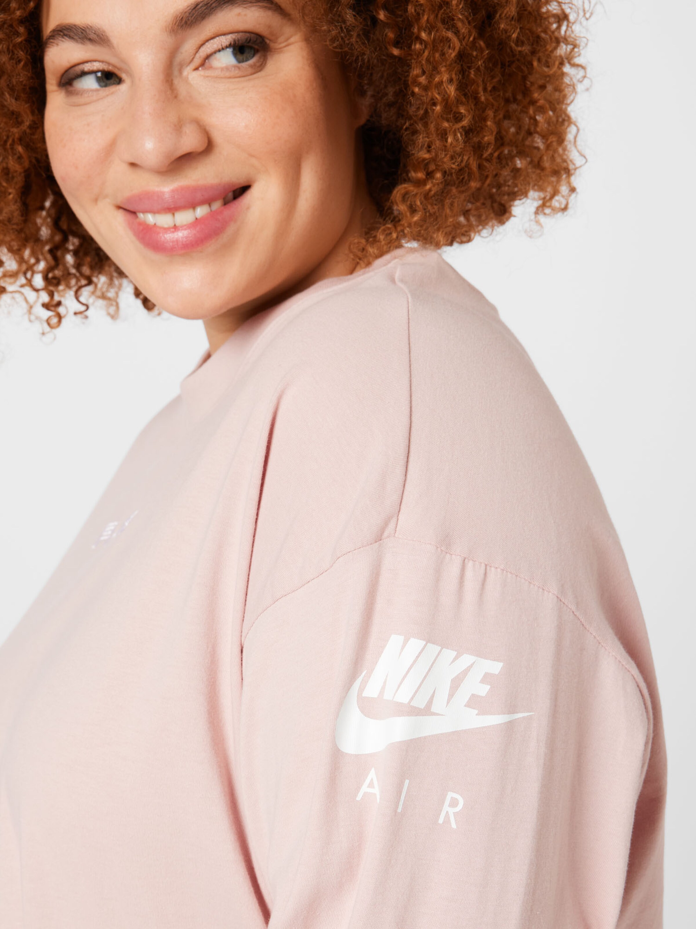Promos T-shirt Nike Sportswear en Rose 