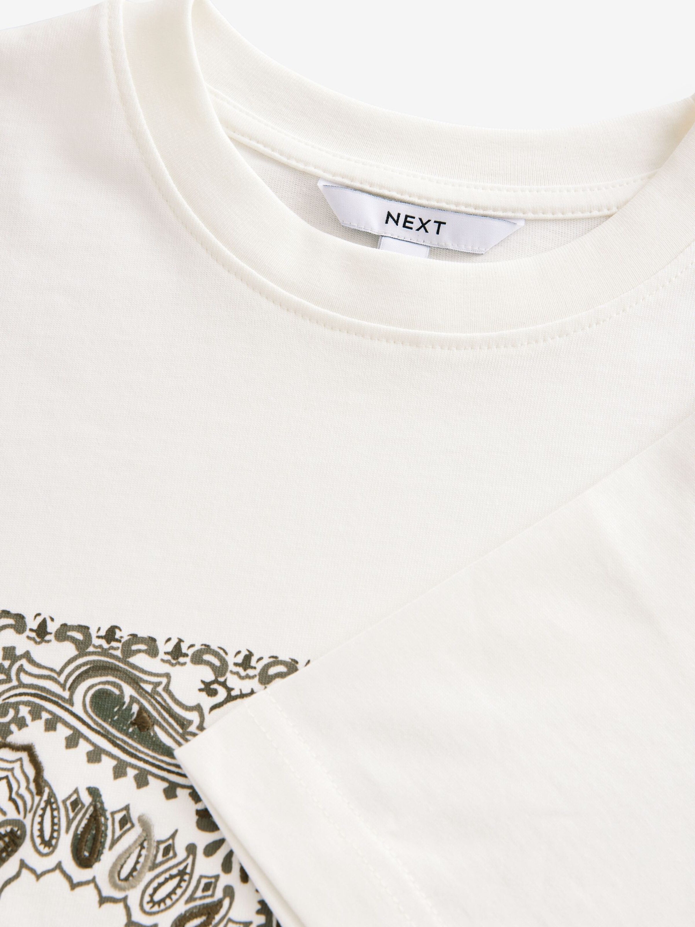 Next Paita värissä valkoinen