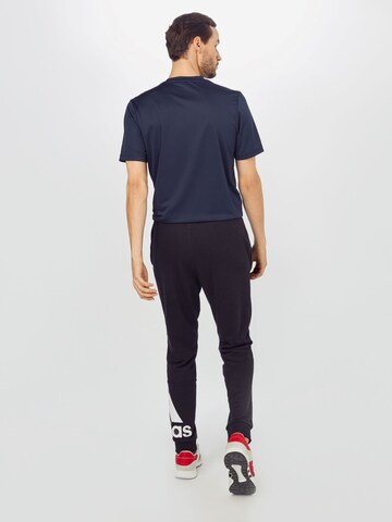 Effilé Pantalon de sport 'Essentials French Terry Tapered Cuff Logo' ADIDAS SPORTSWEAR en noir