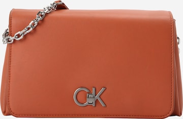 Calvin Klein - Bolso de hombro en naranja: frente
