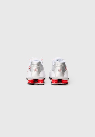 Nike Sportswear Matalavartiset tennarit 'Shox NZ' värissä valkoinen