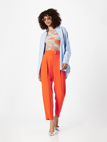 Regular Pantalon à plis 'Tiroko' BOSS en orange