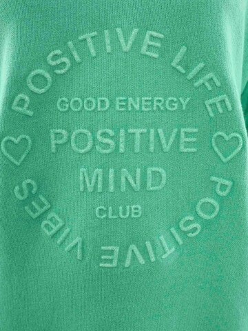 Zwillingsherz Pullover 'Positive Mind' in Grün