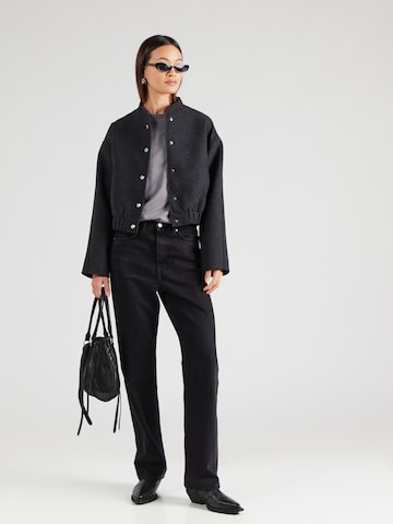 Tricou 'PCRIA' de la PIECES pe gri